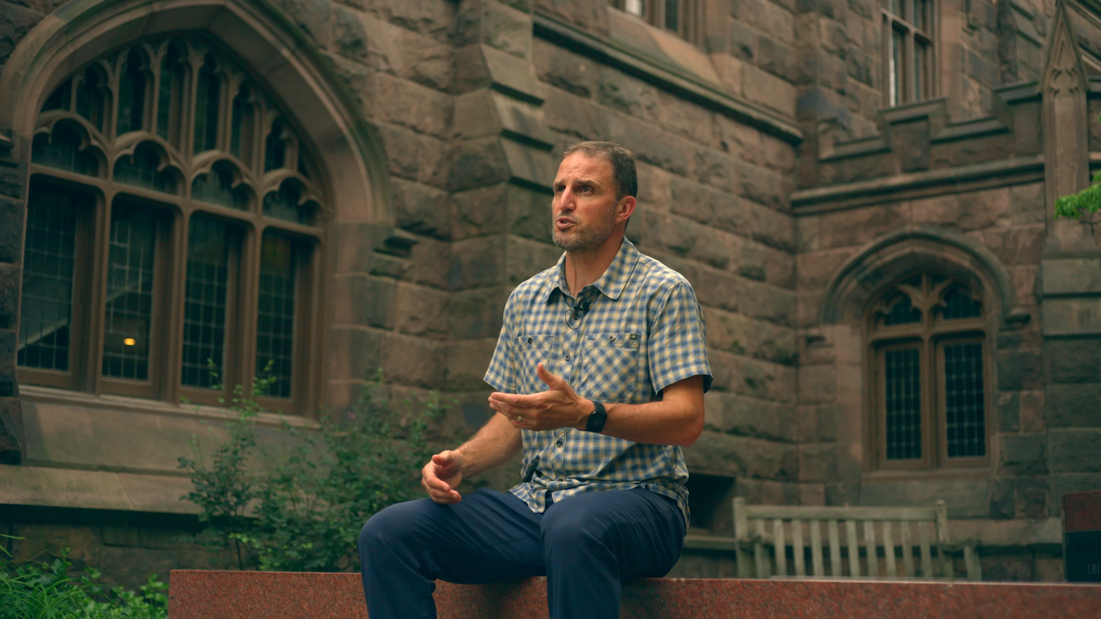 Man by Murray-Doge Hall on Princeton University campus